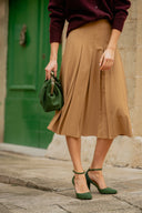 Bag with a green suede clasp